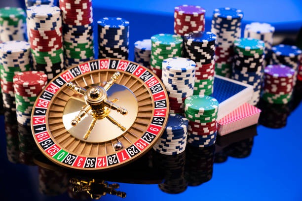 PG Soft live dealer table display on mobile phone showing roulette wheel, betting interface, and live chat
